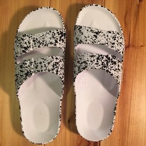White and black speckled pool slides